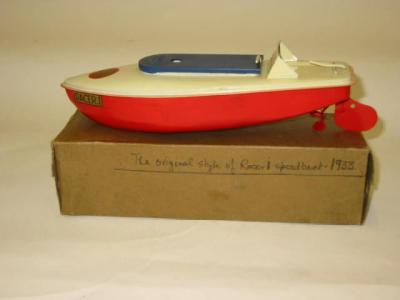 Appraisal: A Racer speedboat clockwork cream deck and red hull original