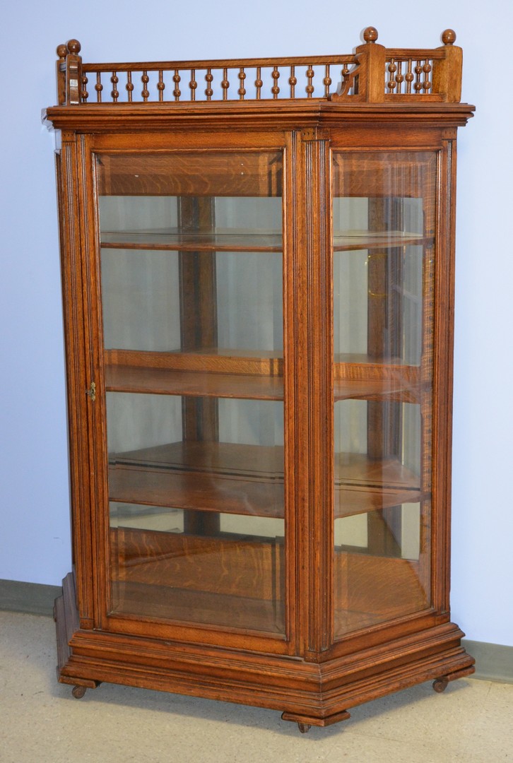 Appraisal: Oak Victorian display cabinet with stick and ball gallery top