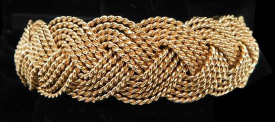 Appraisal: JEWELRY K yellow gold stamped braided bracelet contained in custom