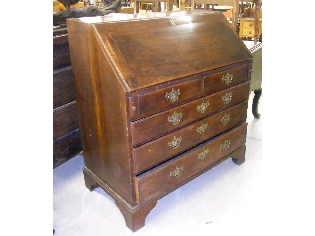 Appraisal: Georgian oak bureau the fall-front enclosing a fitted interior over