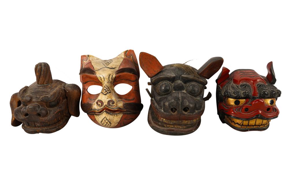 Appraisal: FOUR CARVED ASIAN ARTICULATING MASKSCondition with areas of wear throughout