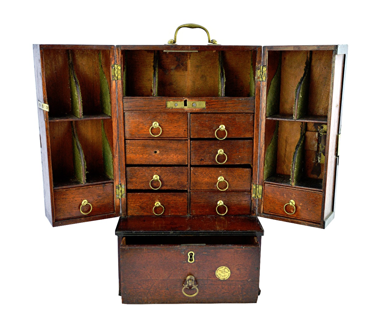 Appraisal: A George III mahogany apothecary cabinet with a pair of