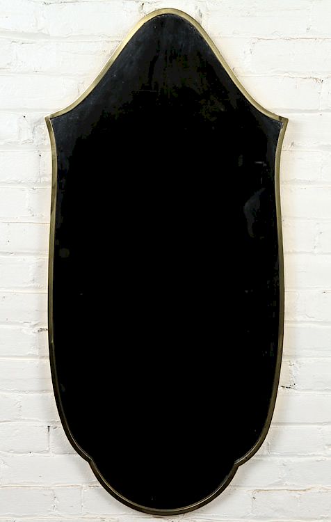 Appraisal: SHAPED BRASS ITALIAN MIRROR CIRCA A shaped brass Italian mirror