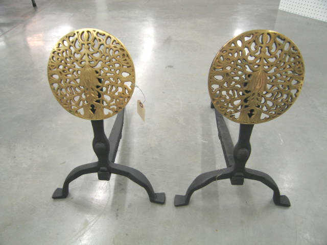 Appraisal: Pair of Brass Cast Iron Andirons Arts Crafts style floral