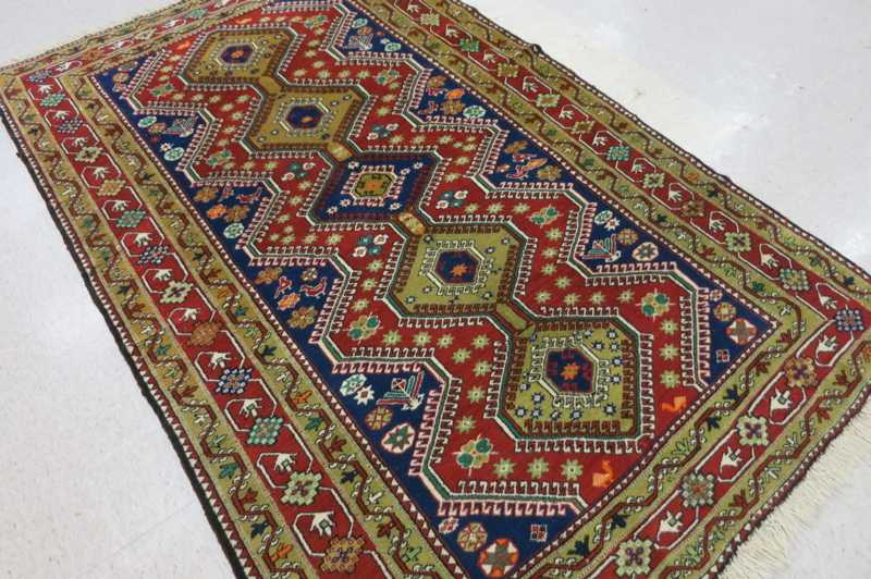 Appraisal: HAND KNOTTED ORIENTAL AREA RUG Persian geometric and stylized floral