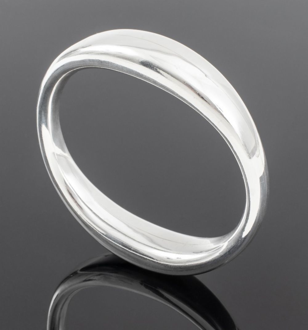 Appraisal: TIFFANY CO SILVER BANGLE Tiffany Co bangles cast and assembled