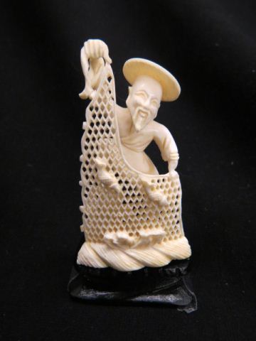 Appraisal: Chinese Carved Ivory Figurine of a Fisherman holding a fancy