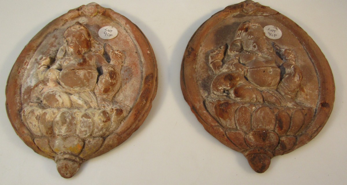 Appraisal: A pair of Indian terracotta wall plaques each formed and