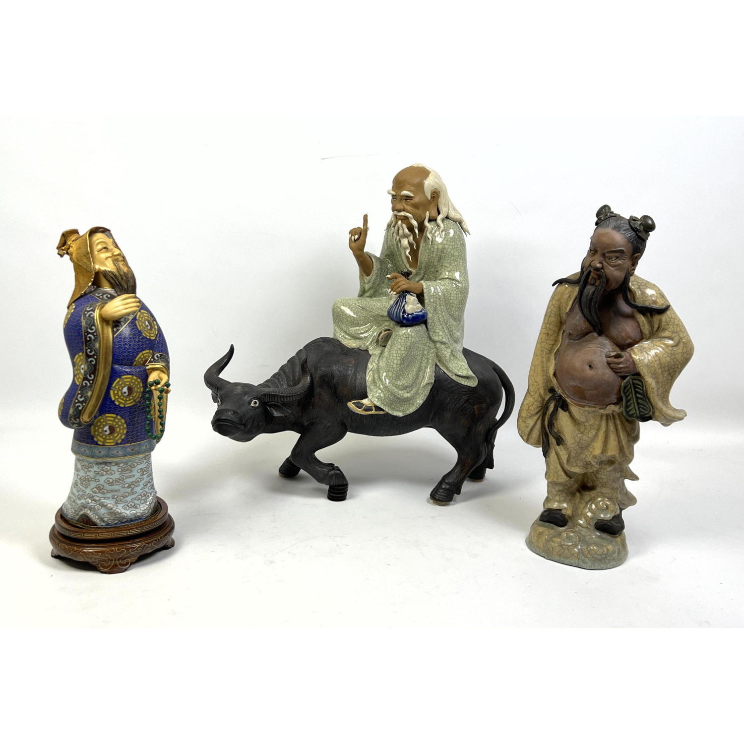 Appraisal: pc Asian Figural Sculpture Lot One Cloisonne Figure Two Ceramic