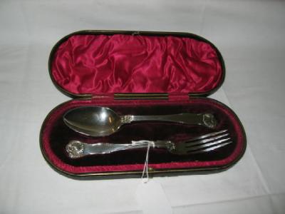 Appraisal: A VICTORIAN DESSERT SPOON AND FORK SET in Kings husk