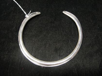 Appraisal: Sterling silver collar necklace Stiff form collar of simple omega