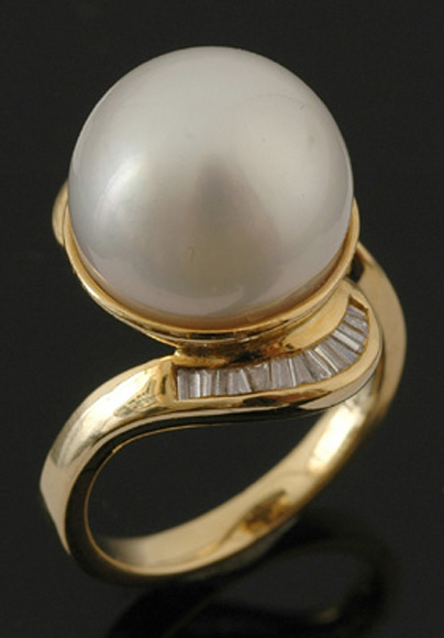 Appraisal: A South Sea pearl and diamond ring The round pearl