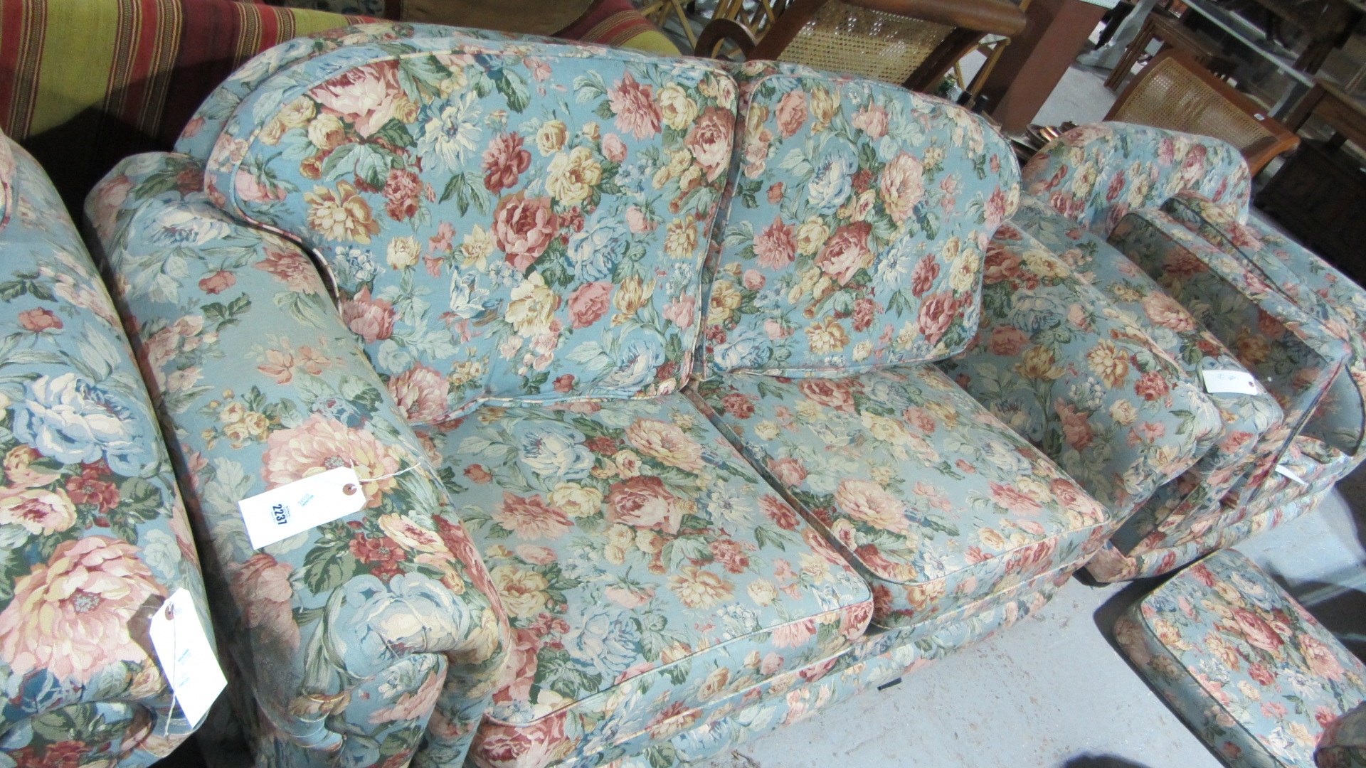 Appraisal: A three seater floral sofa