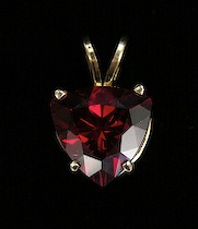 Appraisal: Ladies' Garnet Pendant An approx ct trillion cut garnet prong