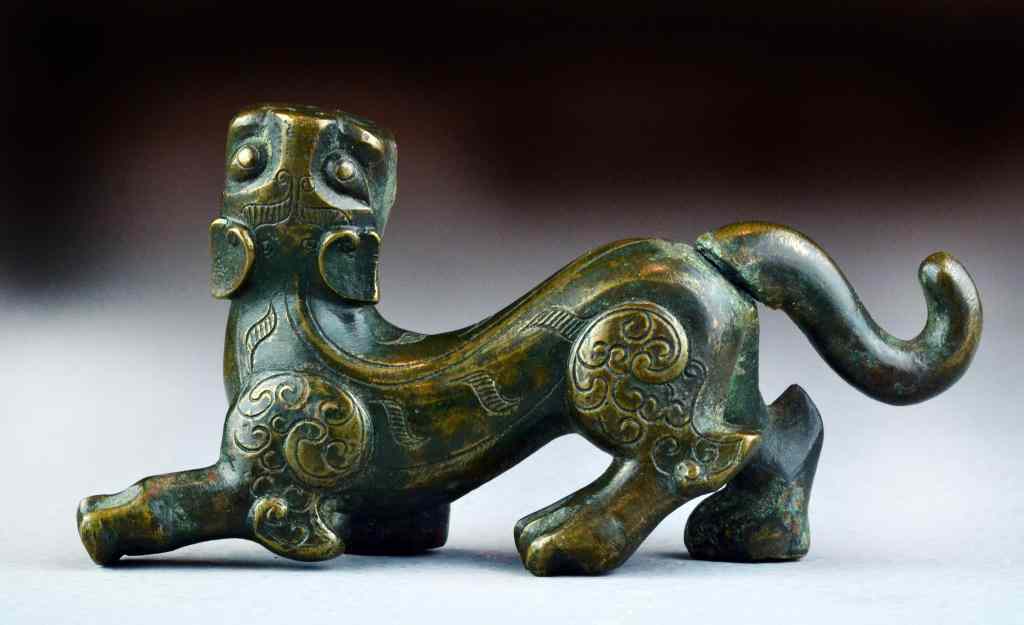 Appraisal: Chinese Ming Bronze Mythocal BeastDepicting a staanding fierce beast the