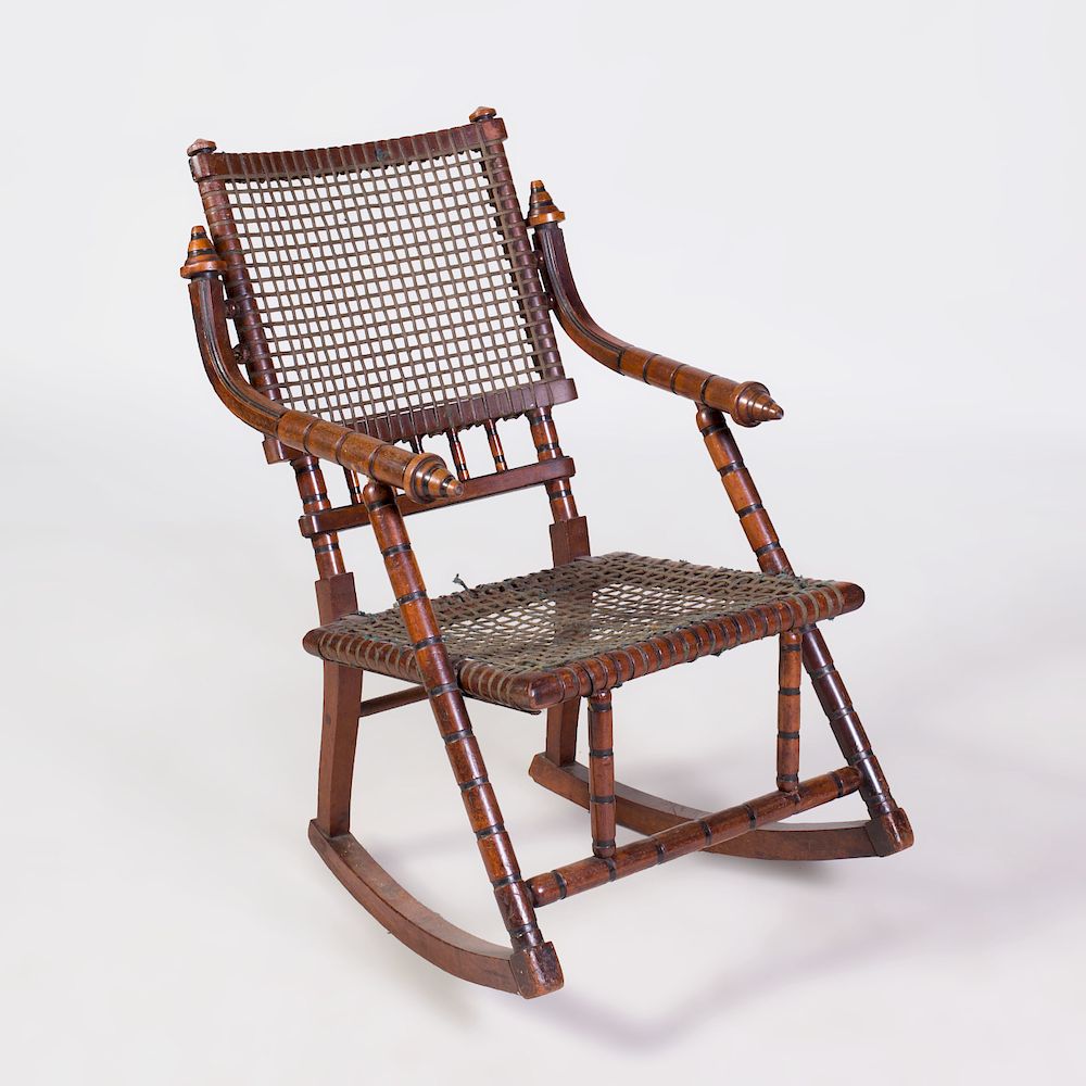 Appraisal: Hunzinger Mahogany and Ebonized Rocking Chair Stamped 'Hunizinger' and patent