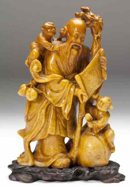 Appraisal: Chinese Soapstone Figural Groupinghand-carved with central Lohan holding a scroll