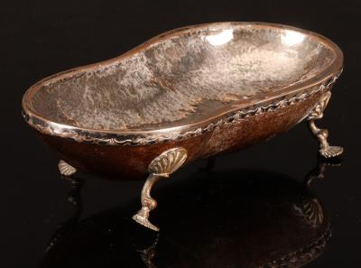 Appraisal: An oblong nut dish on scroll feet cm x cm