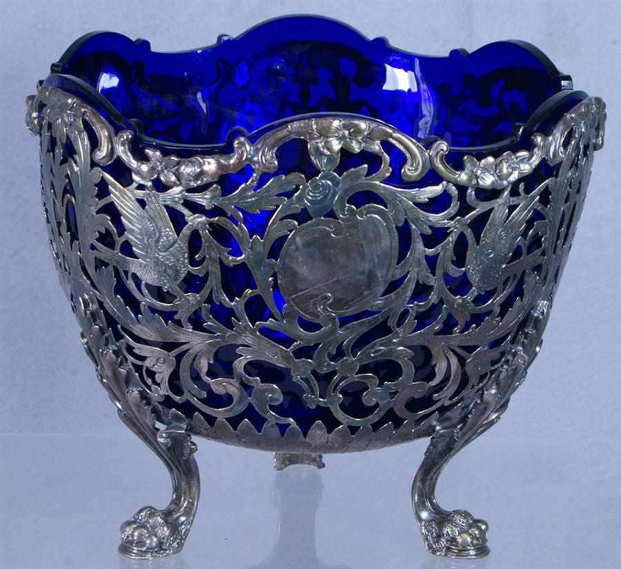 Appraisal: English silver footed center bowl with engraved reticulated body exotic