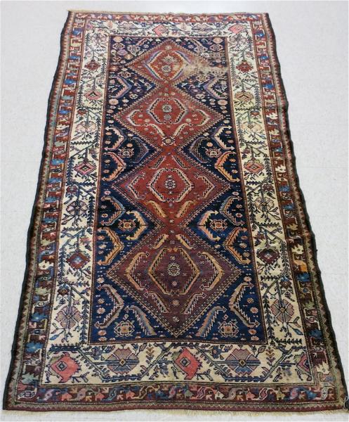 Appraisal: SEMI-ANTIQUE PERSIAN TRIBAL AREA RUG four diamond medallion and stylized