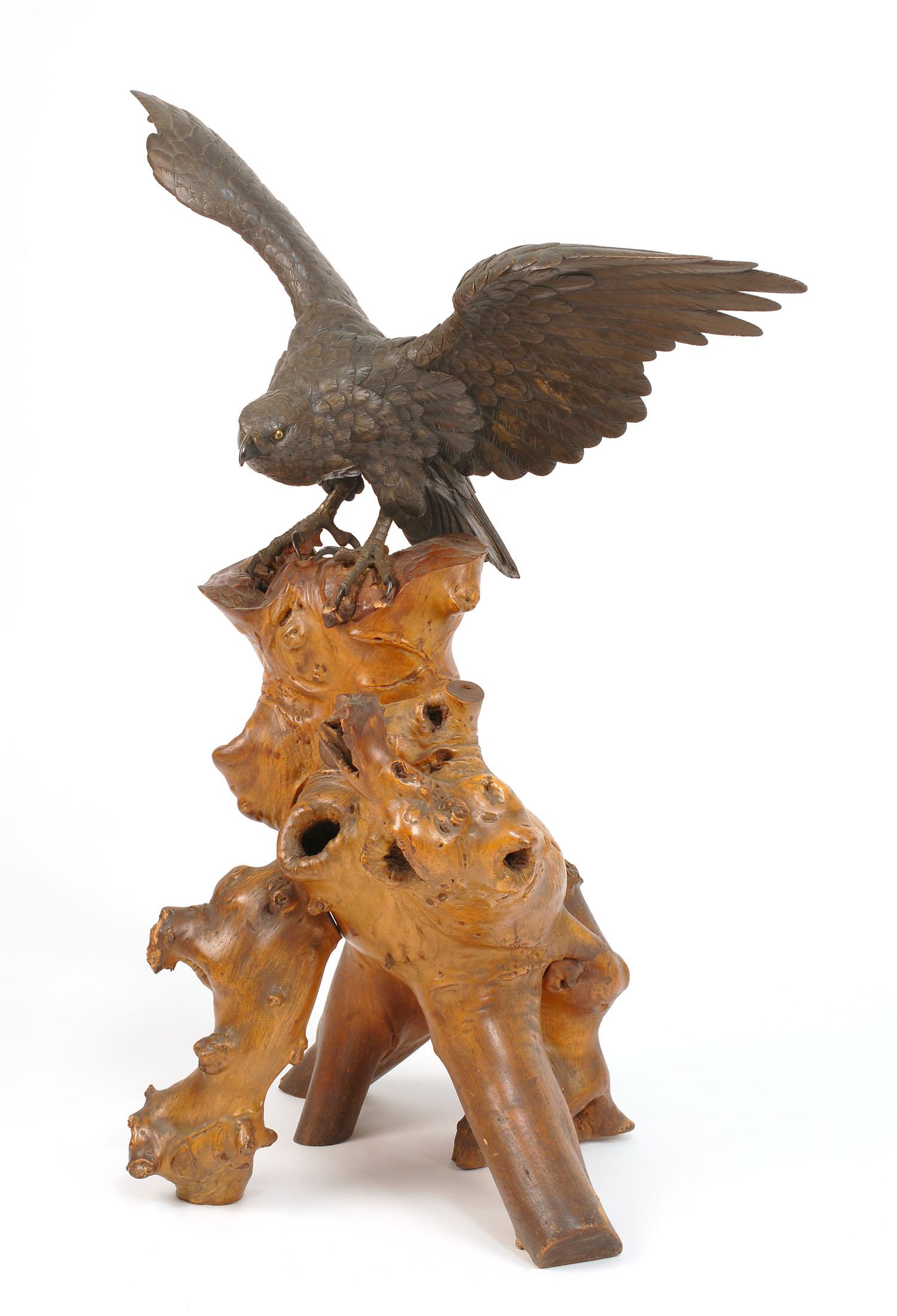 Appraisal: INLAID BRONZE FIGURE OF AN EAGLE Meiji PeriodPerched on a