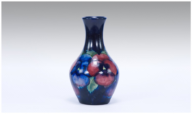 Appraisal: Moorcroft Small 'Pansy' Vase Deep Blue Ground with a Continuous