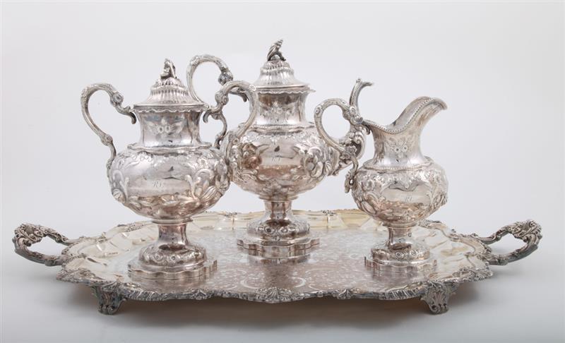 Appraisal: AMERICAN SILVER THREE-PIECE TEA SET WITH LATER MONOGRAM AND A