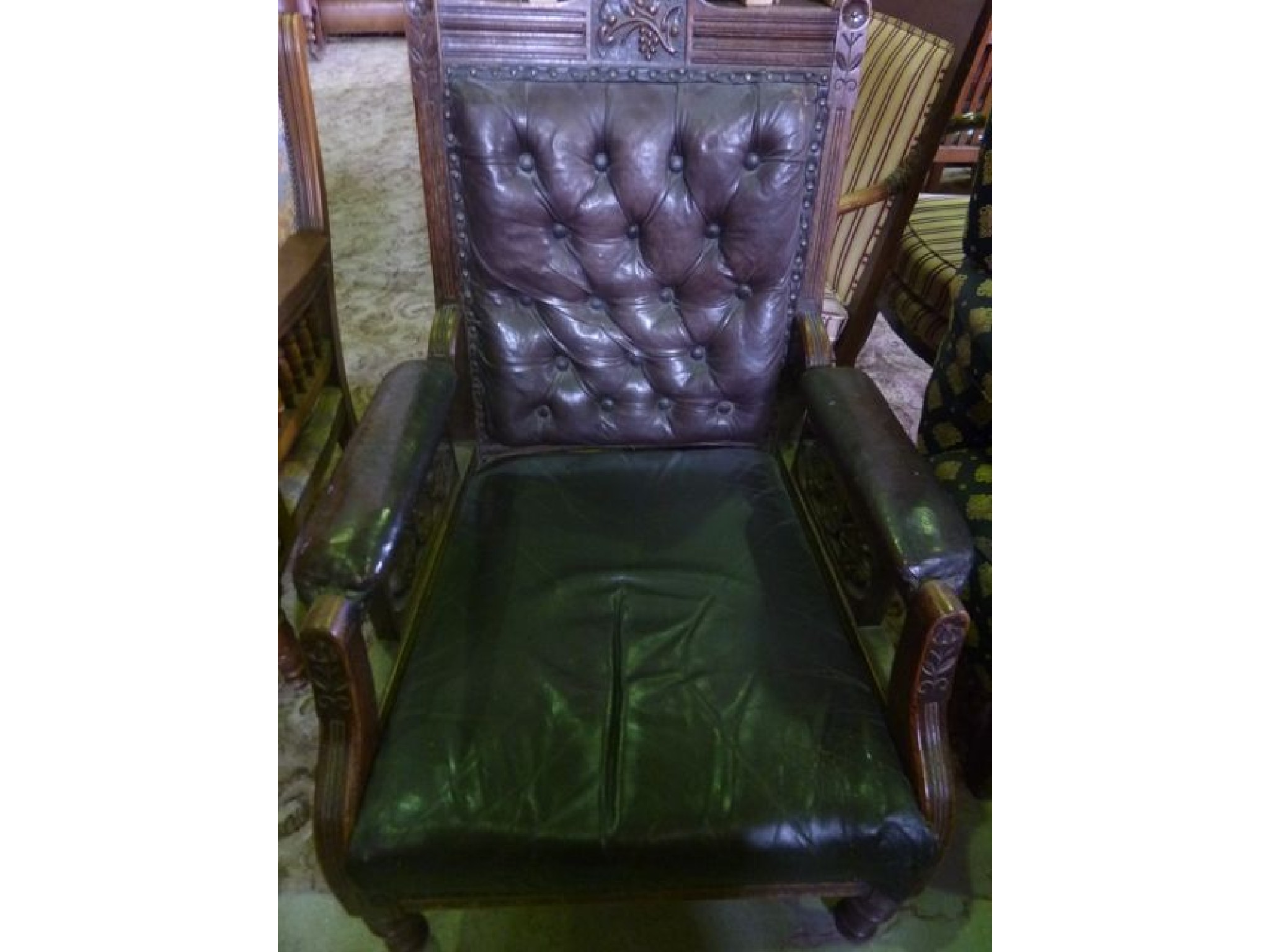 Appraisal: A Victorian drawing room chair with leather and rexine upholstered