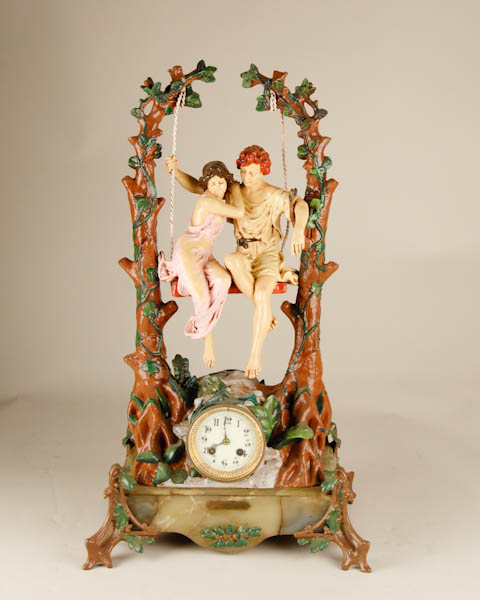 Appraisal: Idle Spring French Swing Clock marble base with enameled cast-iron