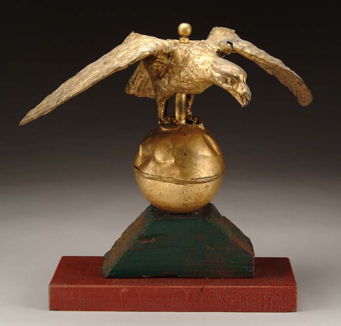 Appraisal: TH CENTURY GILT METAL EAGLE ON BALL Possibly a weathervane