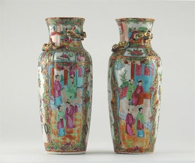 Appraisal: A near pair of Chinese Canton famille rose vases decorated