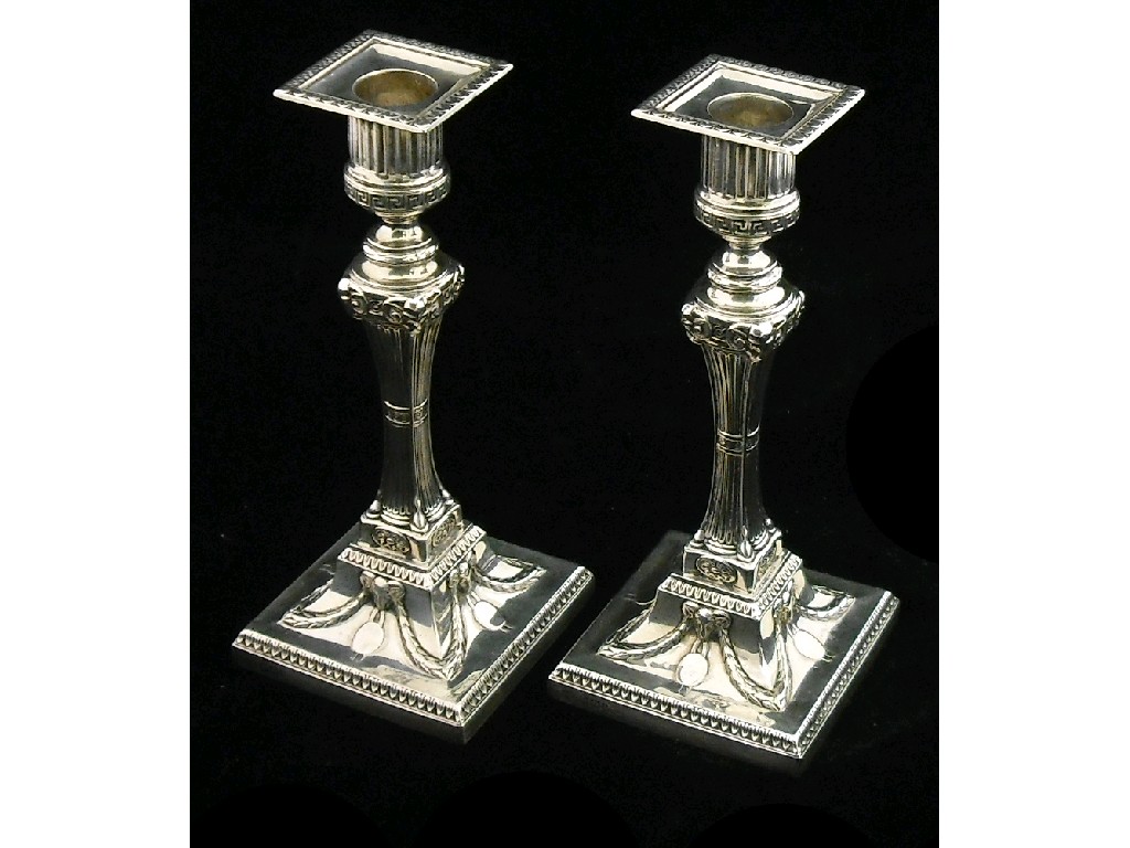 Appraisal: Good Victorian pair of neo-classical style loaded candlesticks by Hawksworth