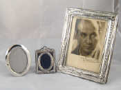 Appraisal: Silver frames A photo frame x cm an oval frame