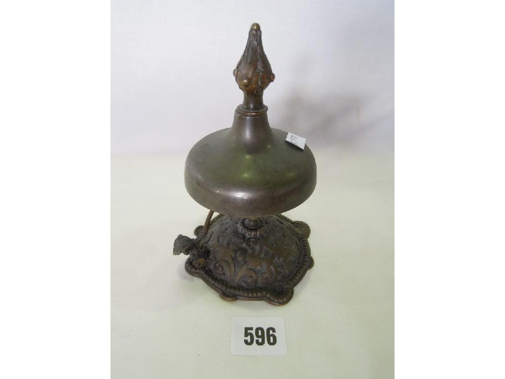 Appraisal: A hotel desk bell with shaped finger pad with a