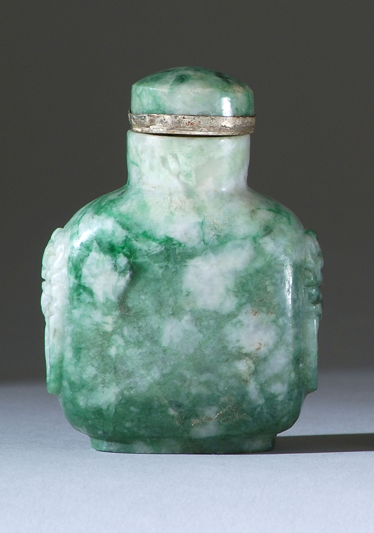 Appraisal: GREEN AND WHITE JADE SNUFF BOTTLE Circa In modified rectangular