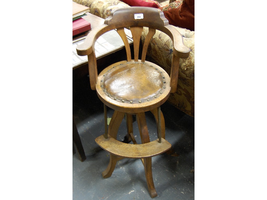 Appraisal: Child's high chair with bar back and swivel seat