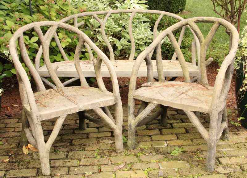 Appraisal: Faux Bois Garden Suitecast stone piece set including a settee