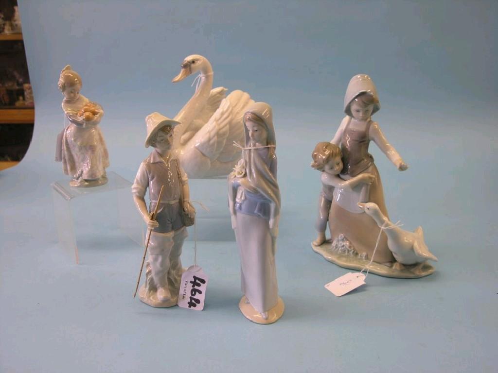 Appraisal: Five Lladro porcelain models girl boy and duck fisherboy girl