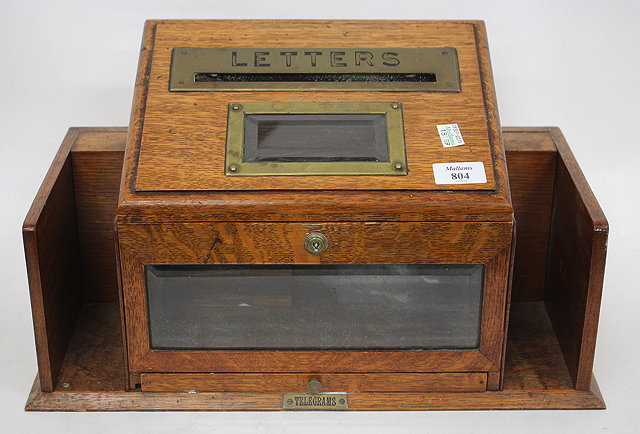 Appraisal: AN EARLY TH CENTURY OAK LETTER BOX with brass mounts