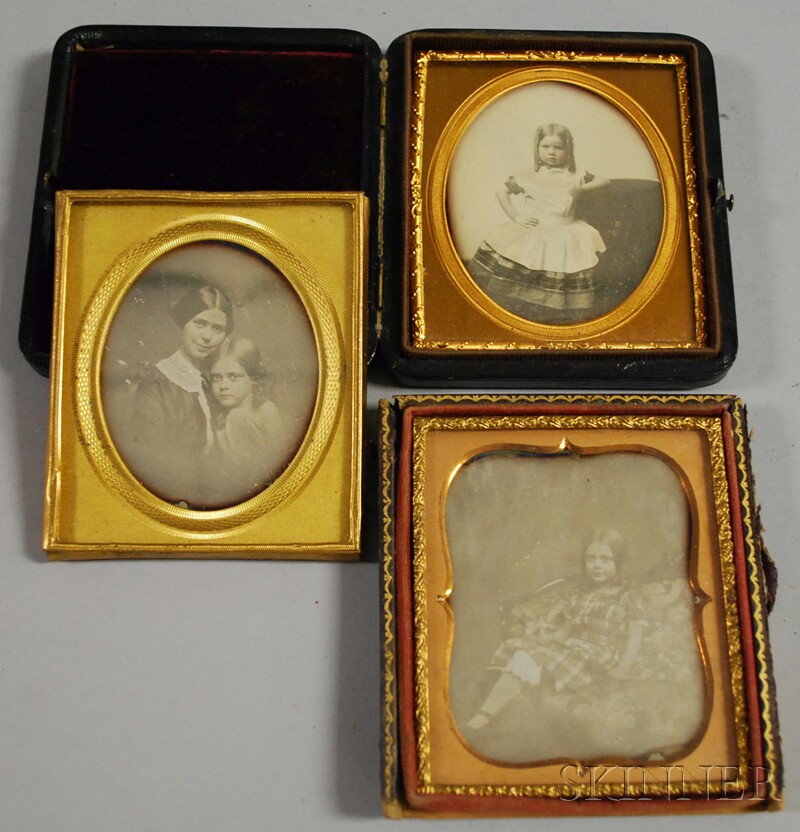 Appraisal: Three Daguerreotype Portrait Photographs a mother and child a child