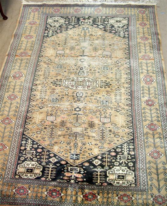 Appraisal: Coffee ground Persian rug geometric floral borders and a central