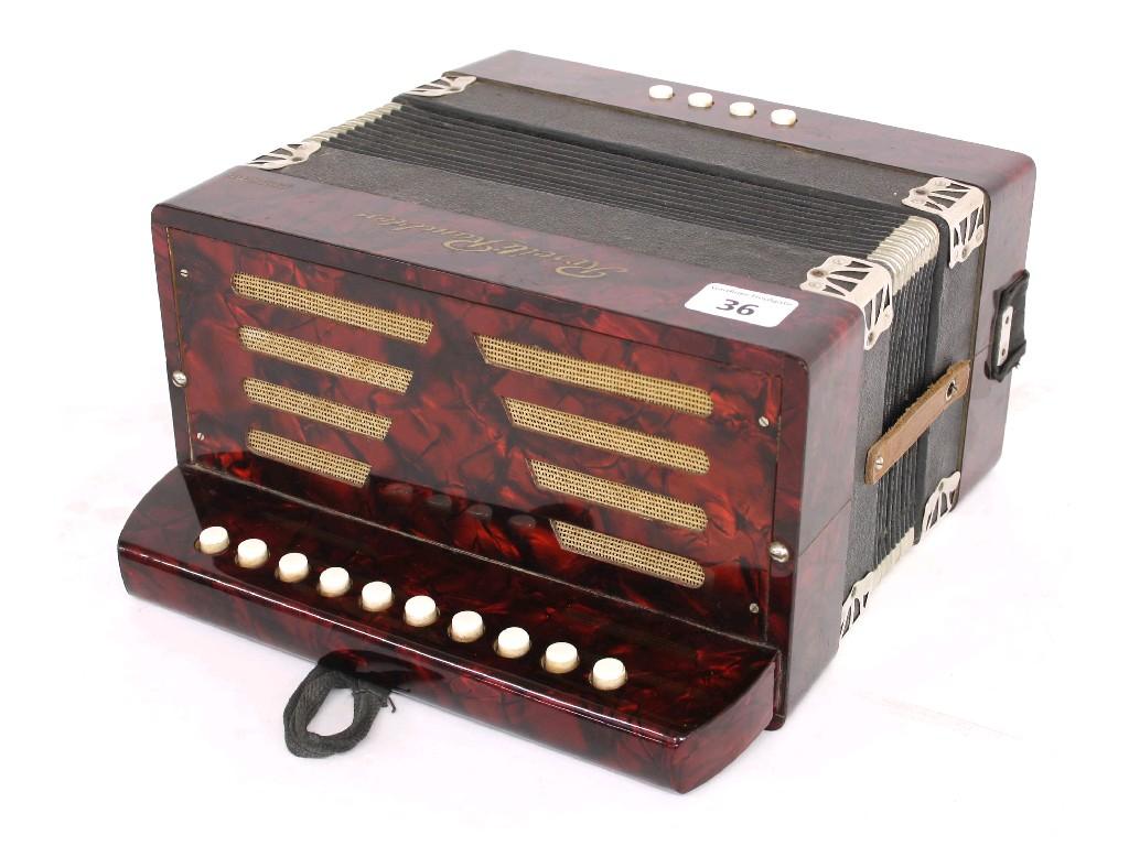 Appraisal: Rosetti Rambler melodeon with four bass buttons and red pearloid