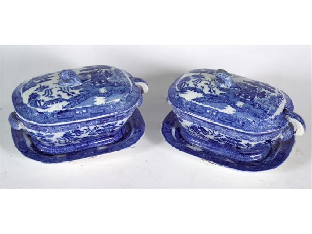 Appraisal: PAIR OF STAFFORDSHIRE PEARLWARE BLUE WILLOW SAUCE TUREENS ON STANDS