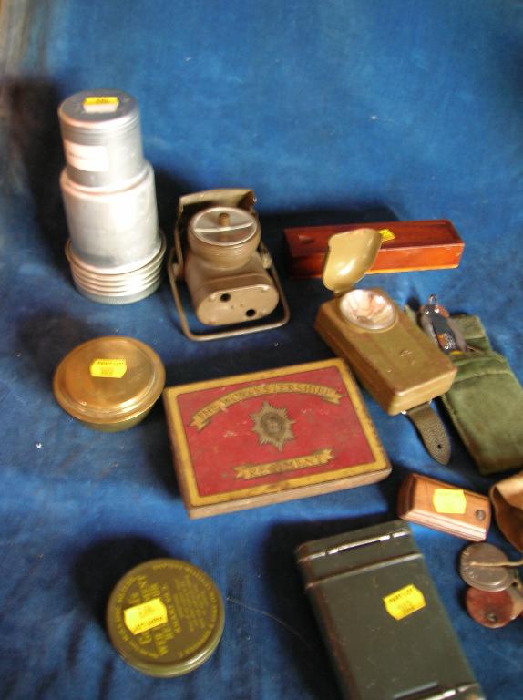 Appraisal: An assorted lot of militaria including two military torches a