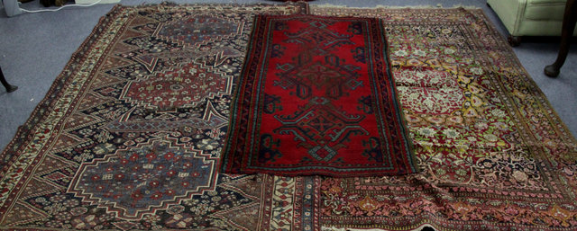 Appraisal: A Persian part silk rug th Century the central medallion