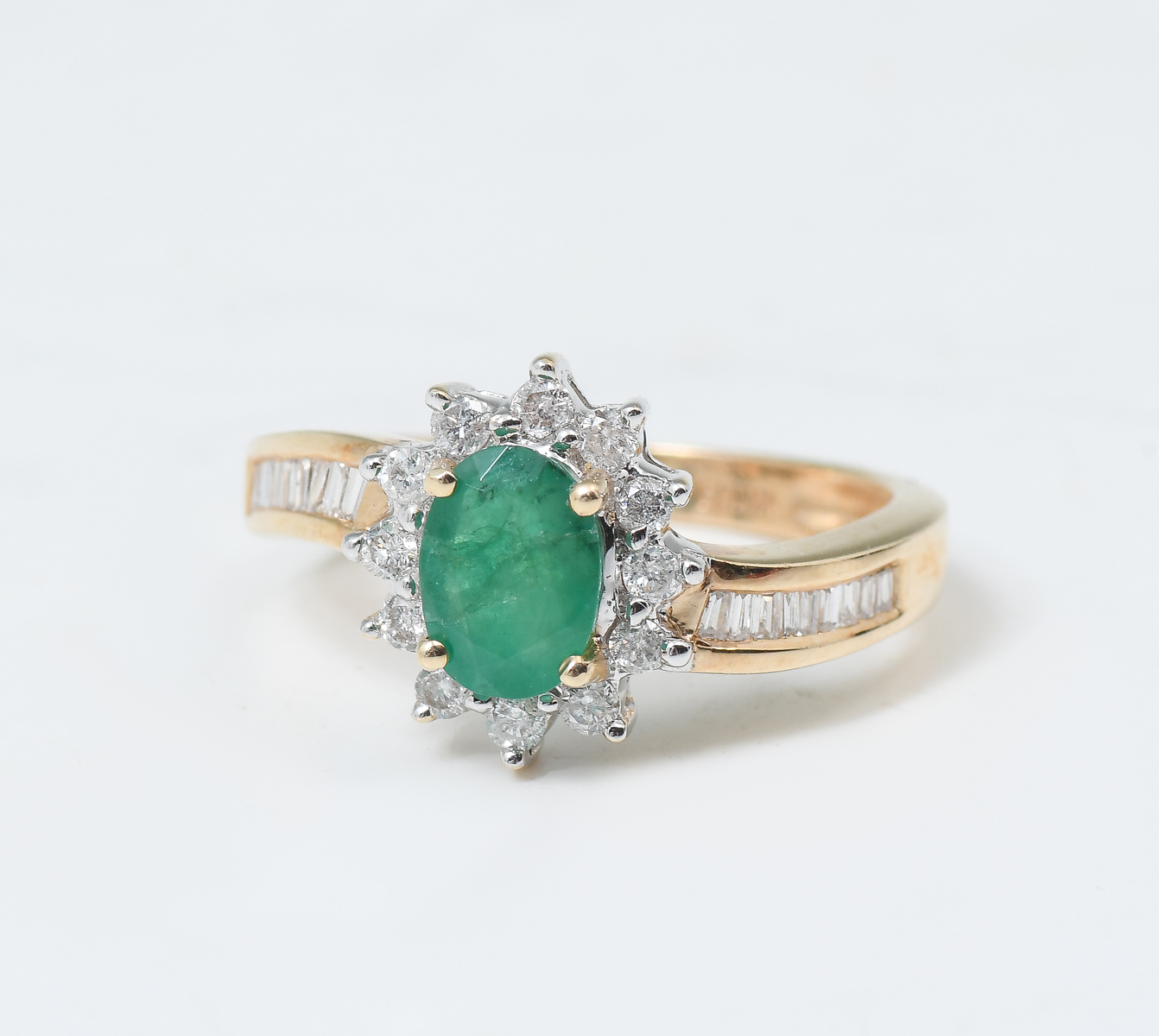 Appraisal: K EMERALD DIAMOND RING K yellow gold ring contains round