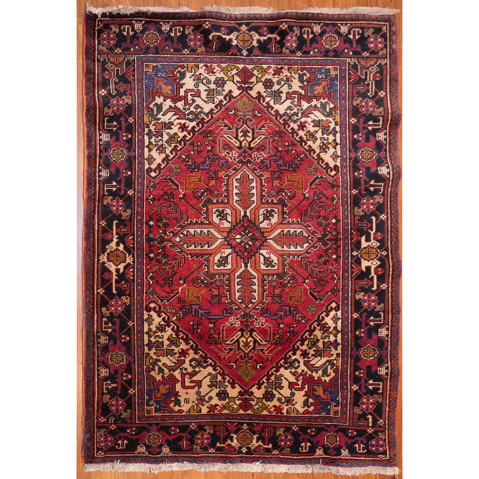 Appraisal: HERIZ RUG PERSIA X Fourth quarter- th century hand-knotted wool