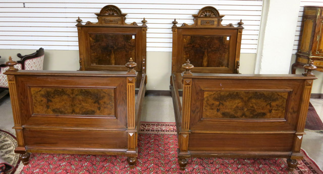 Appraisal: PAIR OF WALNUT TWIN BEDS WITH RAILS Louis XVI style