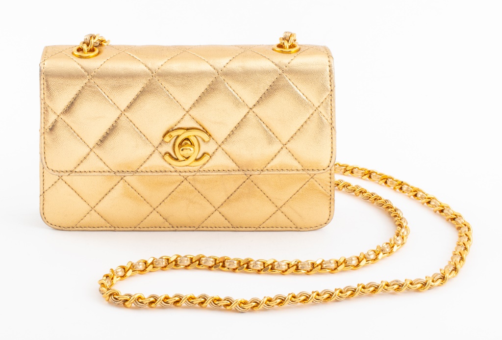 Appraisal: CHANEL QUILTED METALLIC GOLD LEATHER PURSE Chanel quilted metallic leather