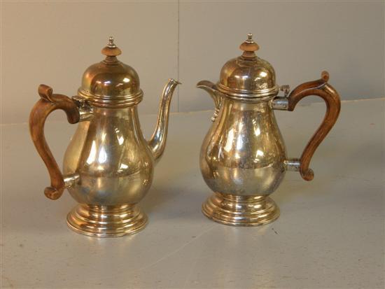 Appraisal: Modern silver coffee pot and matching hot water jug of